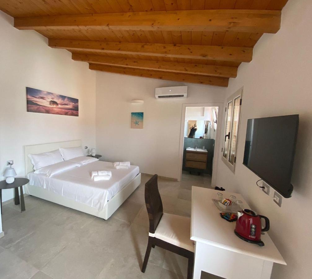 Punto Zero Rooms Сан-Теодоро Экстерьер фото
