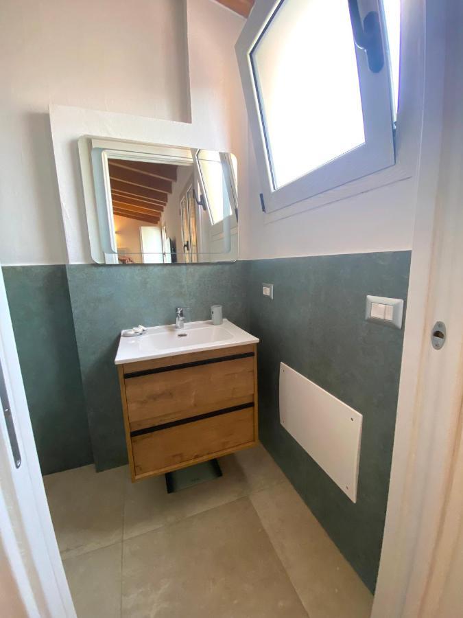Punto Zero Rooms Сан-Теодоро Экстерьер фото