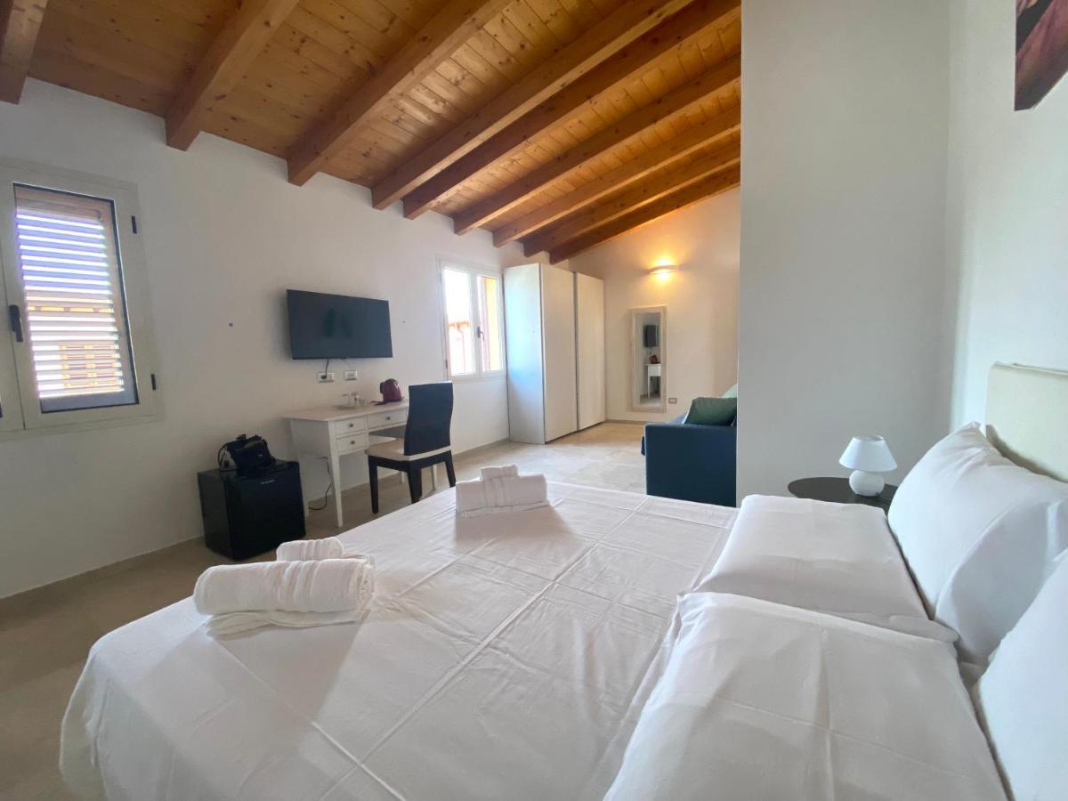 Punto Zero Rooms Сан-Теодоро Экстерьер фото