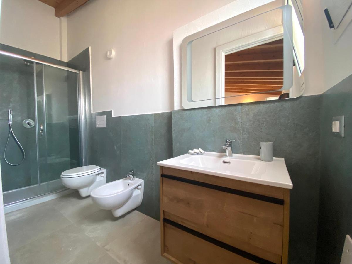 Punto Zero Rooms Сан-Теодоро Экстерьер фото