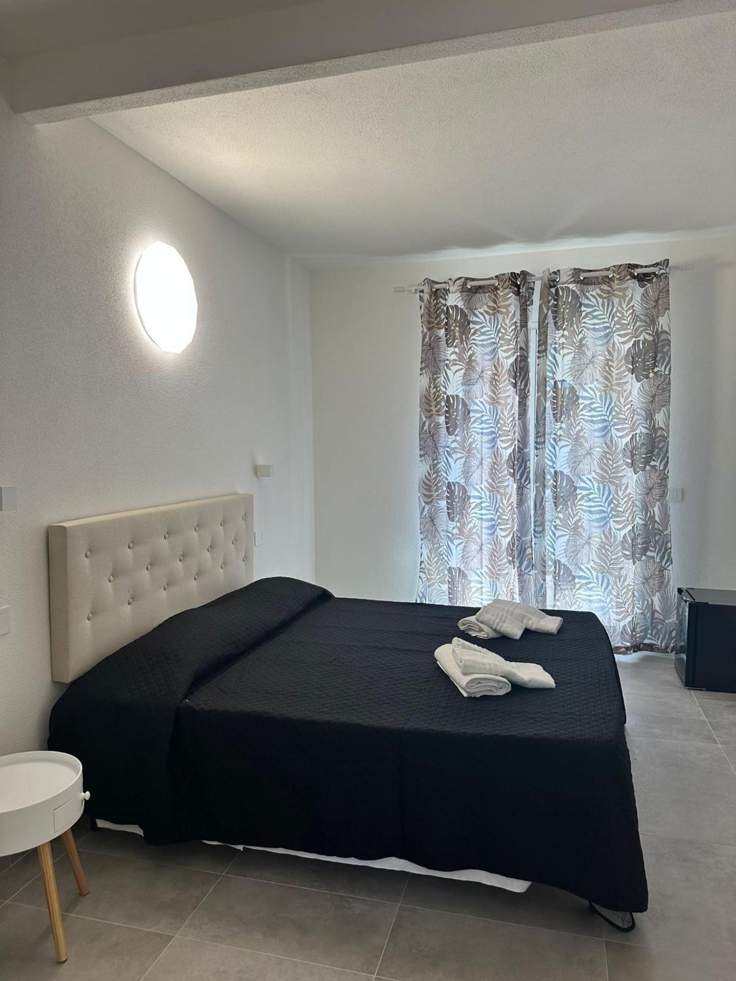 Punto Zero Rooms Сан-Теодоро Экстерьер фото