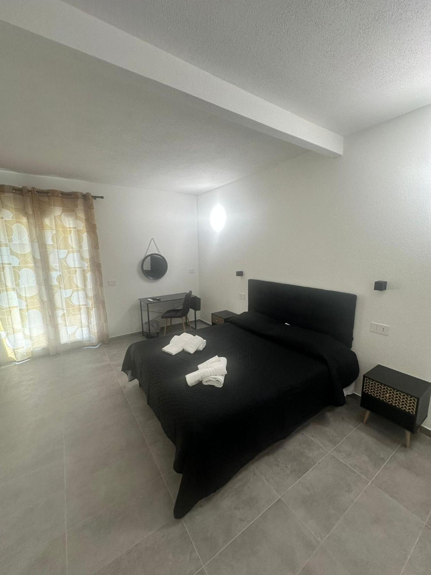 Punto Zero Rooms Сан-Теодоро Экстерьер фото