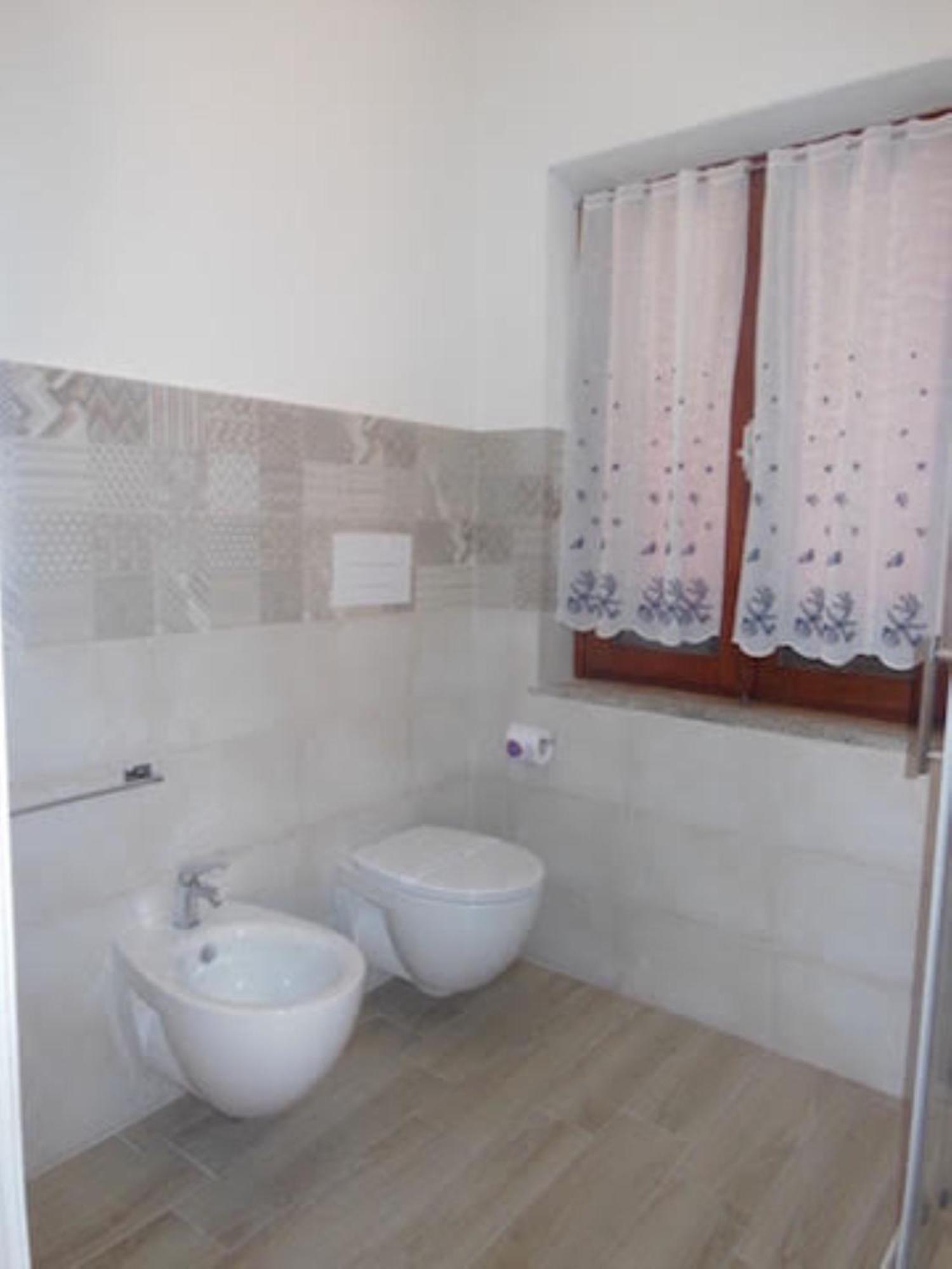 Punto Zero Rooms Сан-Теодоро Экстерьер фото