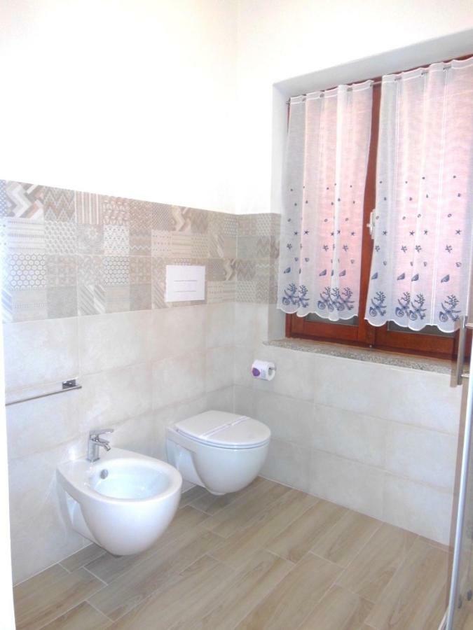 Punto Zero Rooms Сан-Теодоро Экстерьер фото