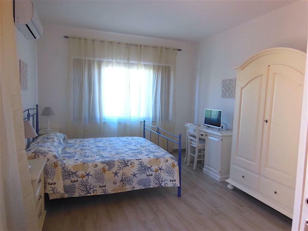 Punto Zero Rooms Сан-Теодоро Экстерьер фото